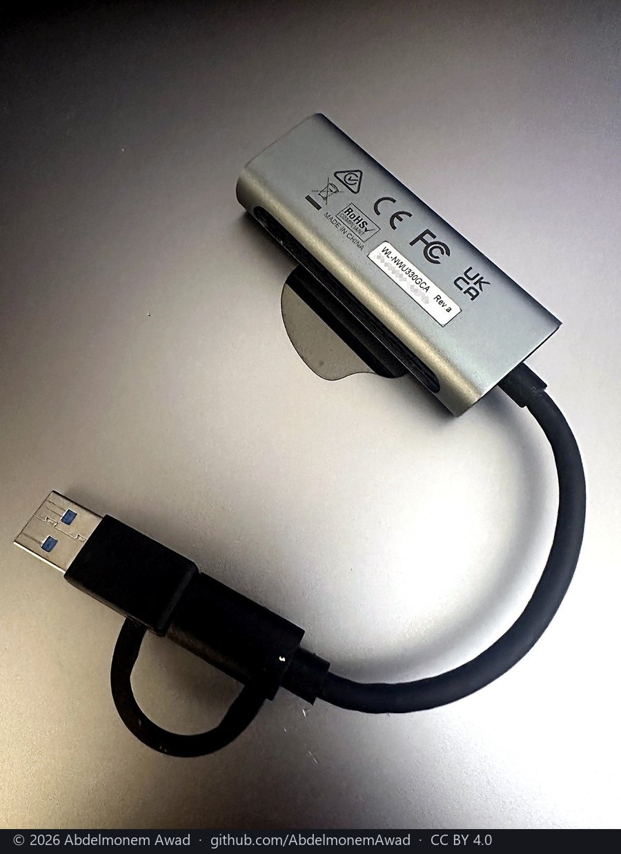 Its label: WL-NWU330GCA, Rev.a, the serial number pixelated